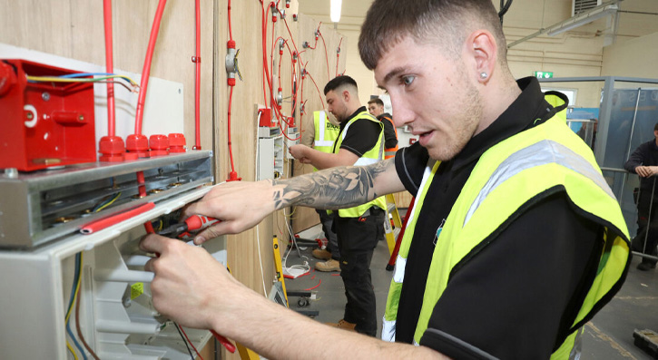 Apprentice Taylor Rollo in competition in the Fire and Security section at last' year's SkillBuild NI Competition